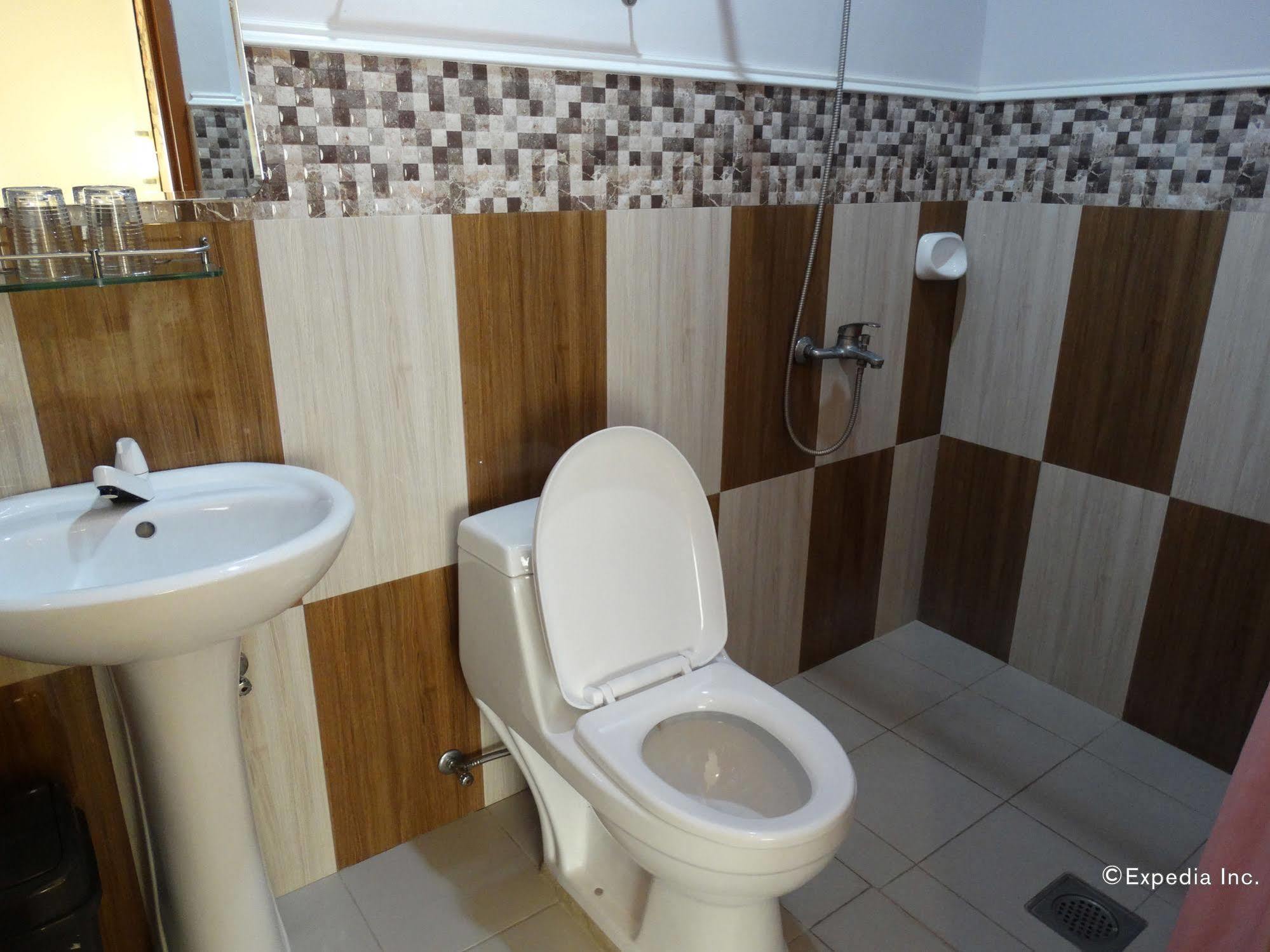 טאגבילראן סיטי Sun Avenue Tourist Inn & Cafe מראה חיצוני תמונה